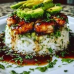 Tangy honey lime chicken served with avocado rice in a delicious stack