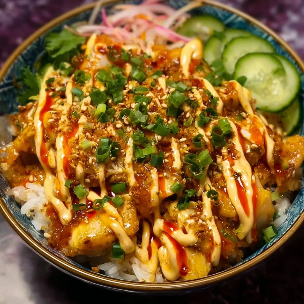 Delicious Bang Bang Chicken Bowl with crispy chicken and creamy sauce