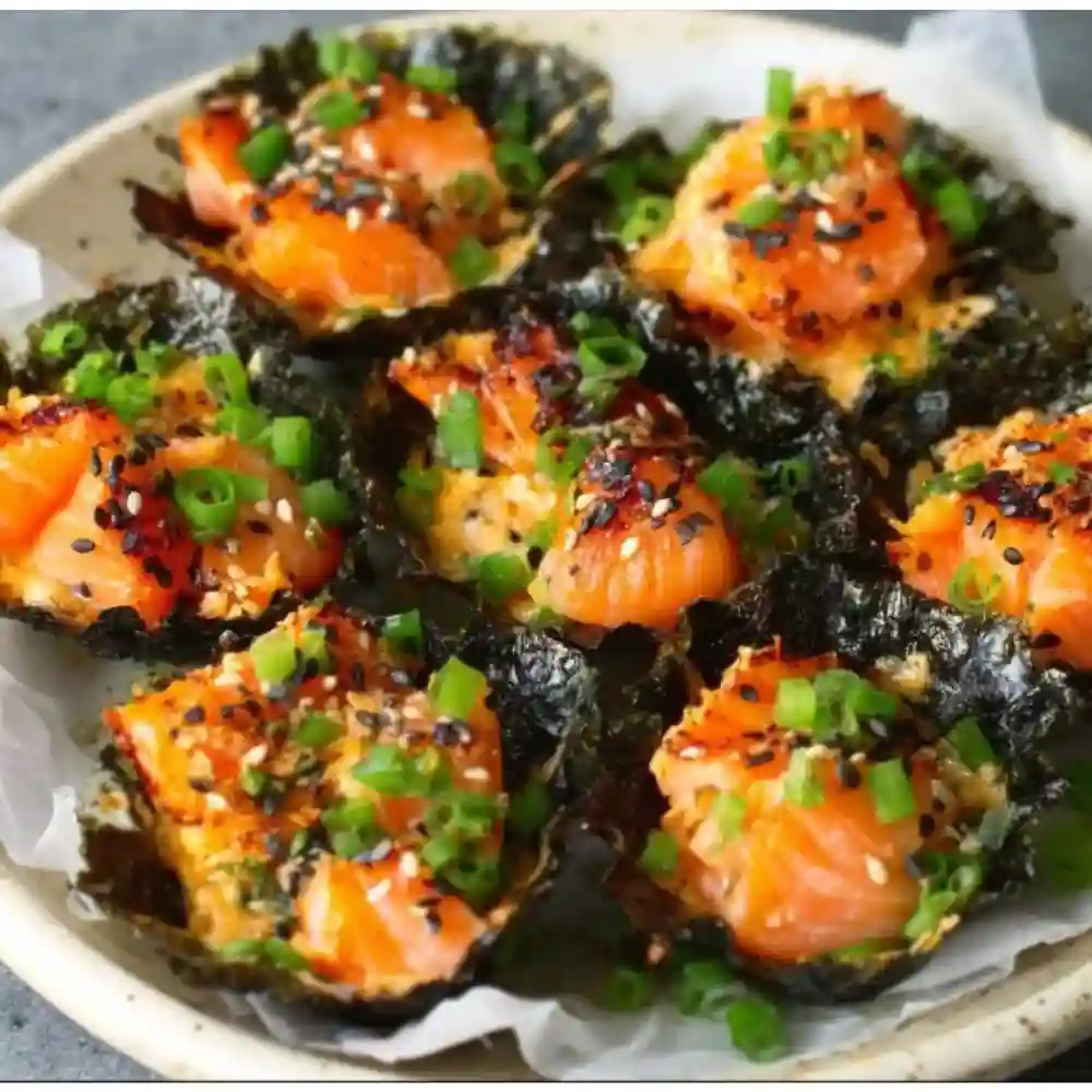 Delicious baked salmon sushi cups served on a platter