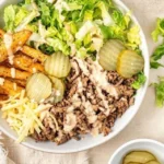 Delicious burger bowls served with fresh vegetables and toppings