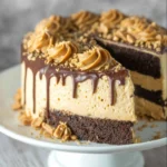Delicious Peanut Butter Chocolate Layer Cake topped with creamy frosting
