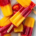 Delicious strawberry mango popsicles made with fresh fruit for a refreshing treat.