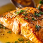 Easy lemon garlic salmon dish with fresh herbs and lemon slices