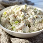 Bowl of easy tuna salad with fresh ingredients on a table