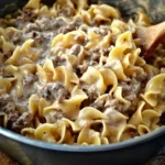 Instant Pot Hamburger Stroganoff garnished with parsley in a bowl