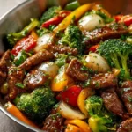 A colorful Beef Stir Fry with fresh vegetables in a savory sauce.