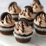 Delicious Cookies and Cream Cupcakes topped with creamy frosting and cookie crumbles.