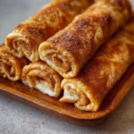 Crispy keto cinnamon cream cheese roll ups for a low-carb snack