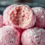 Delicious no-bake strawberry cheesecake bites topped with fresh strawberries
