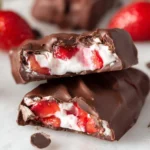 Chocolate strawberry yogurt clusters with chocolate coating and strawberry pieces