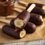 Delicious frozen chocolate covered bananas on a stick