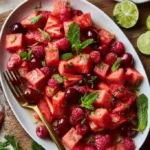Colorful and fresh fruit salad in a bowl with various fruits