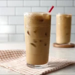 A refreshing glass of high protein iced coffee topped with whipped cream