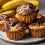 Delicious Nutella banana muffins with a chocolate swirl on top