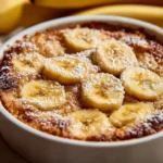 Southern banana cobbler dessert with bananas and a golden crust