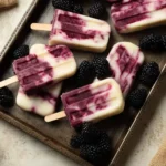 Creamy Blackberry Vanilla Yogurt Pops made with fresh blackberries and yogurt.