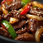 Delicious Chinese pepper steak with onions served on a plate