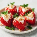 Colorful strawberry deviled eggs served on a platter for a delightful appetizer.